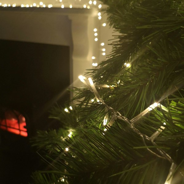 Samuel Alexander 1000 LED 25m Indoor Outdoor Christmas Multi Function Mains Operated String Lights with Timer & Clear Cable in Warm White