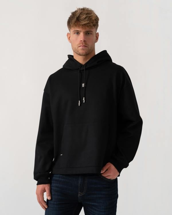 Model wearing HUGO Mens Dineo Mens Pullover Hoodie in Black 001 - Main