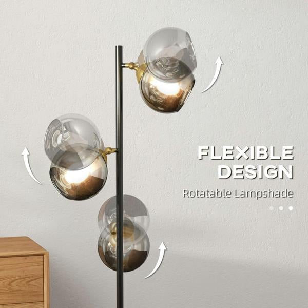 Grey floor lamp with three rotatable globe glass shades on a black pole