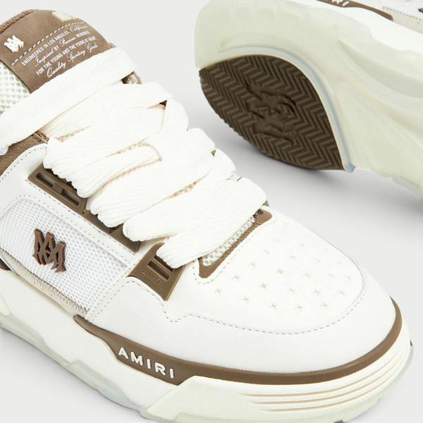 Supplied Fashion AMIRI MA-1 sneakers in white and brown leather with mesh panels and thick laces