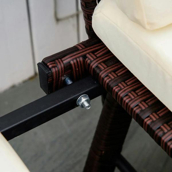 Brown rattan armrest with cream cushion and metal connector hardware