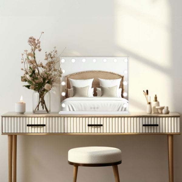 LED Bluetooth mirror with bright bulbs, sleek white frame, and a stylish design, placed on a modern wooden vanity with decor