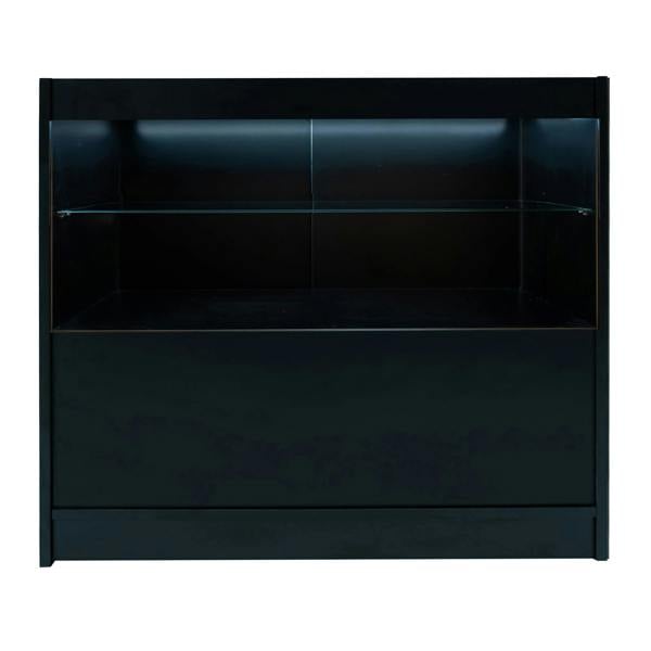 Sleek black Andromeda LED shop counter set featuring a glass shelf and illuminated back panel, perfect for retail displays