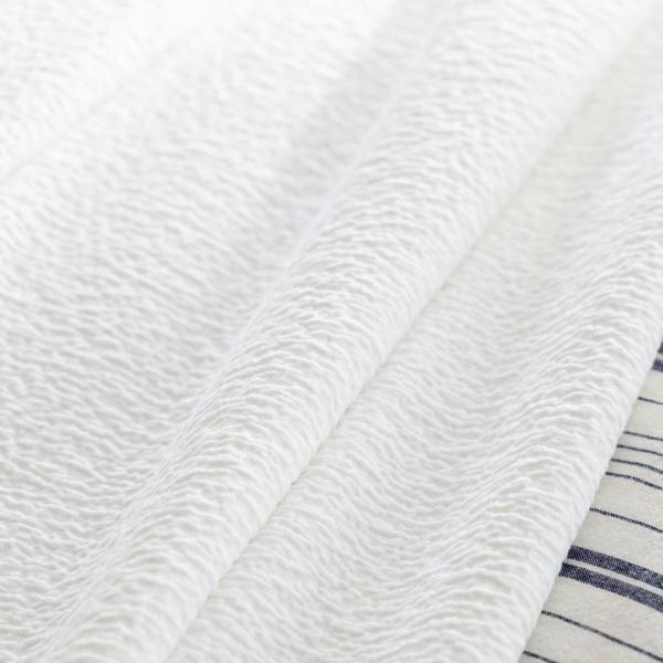 White Textured Matelasse Cotton Bedspread bedroom detail | Soak and Sleep