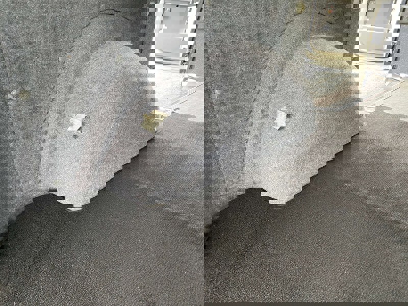 Image T5, T6 SWB Kombi Boot Carpet by OLPRO close up showing the shape around the wheel arch.