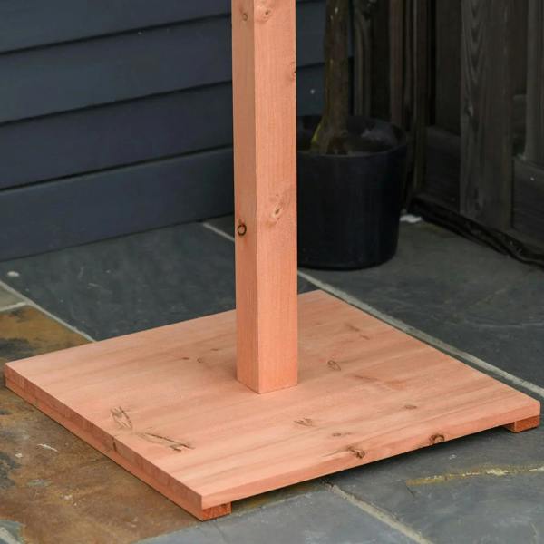Wooden bird feeder base plate with vertical support post, brown finish