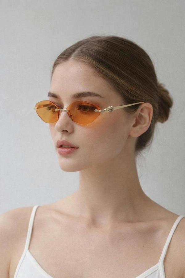 SVNX Rimless Oval Geo Metal Sunglasses in Orange