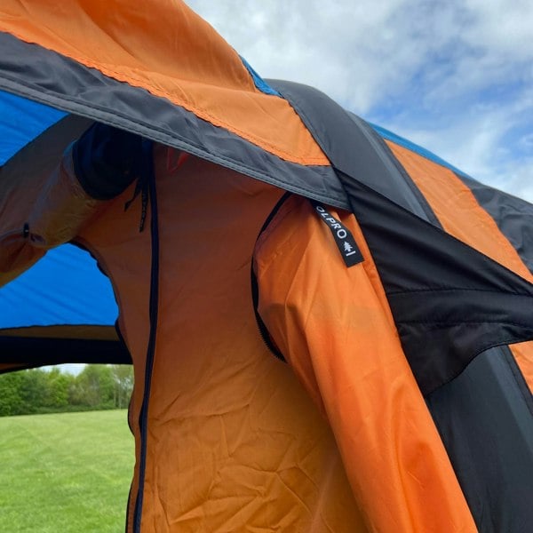 Open J door on the side of the tunnel on a  Loopo Breeze® v2 Inflatable Campervan Awning by OLPRO imageset:Orange