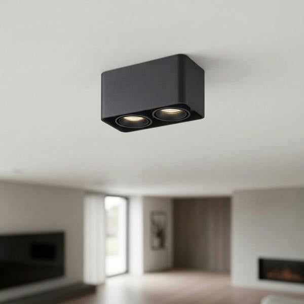 black ceiling light fixture mounted on the ceiling in a modern living room