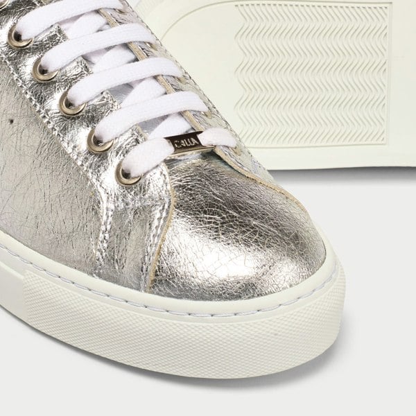 Star silver leather trainer tip close up