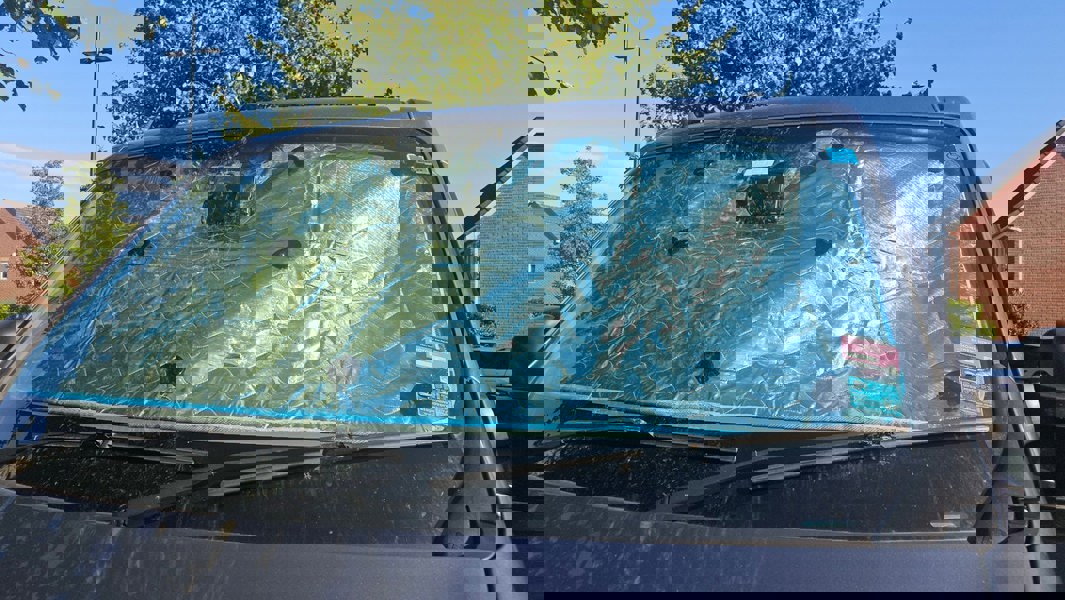 Internal Thermal Blind Set (Renault Master, Vauxhall Movano, Nissan Interstar/NV400) Pictured on the inside windscreen taken from outside the front of the van.