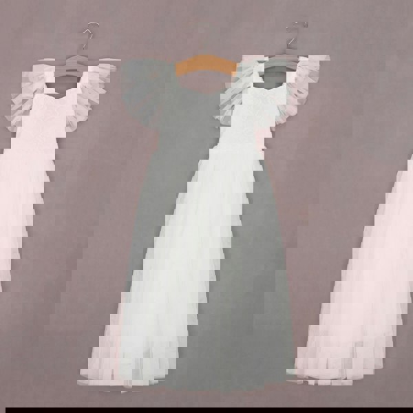 Sofia Dress hanging on a hanger