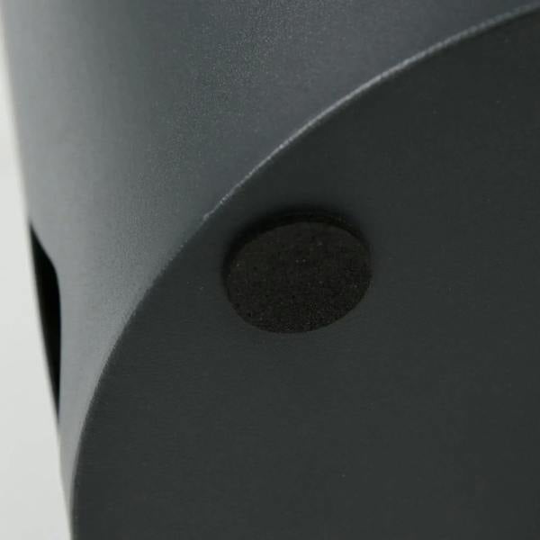 Close-up of dark grey umbrella stand bottom pad with textured grip