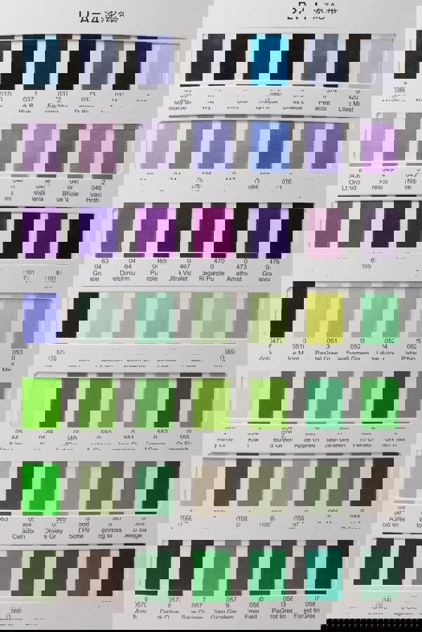 Color swatch chart with various shades of blue, purple, green, and brown.