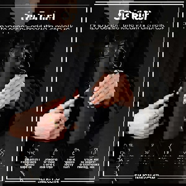 A black water bottle, being held, has a flip top that opens one-handed. The bottle features a triple lock security mechanism and is leak-proof. The context is a person wearing a black blazer.