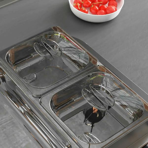 Close-up of stainless 4-tray electric food warmer with clear inset warming pans