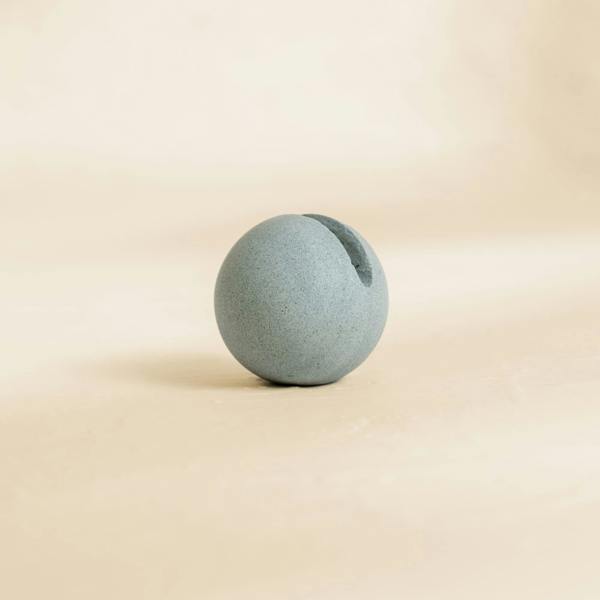Zeolite ball on a beige background for desk organisation