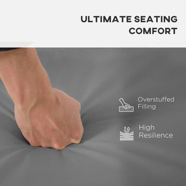 Dark grey outdoor seat cushion pad with overstuffed filling, soft padded surface