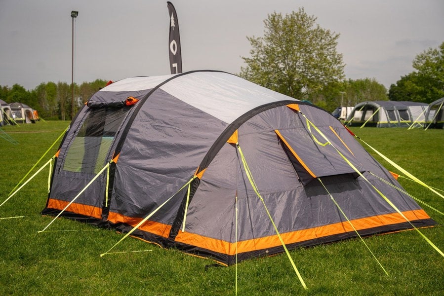 The Abberley Xl Breeze® 4 Berth Inflatable Tent from OLPRO pitched on a campsite.