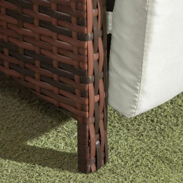 Brown rattan chair leg and woven arm corner with cream cushion