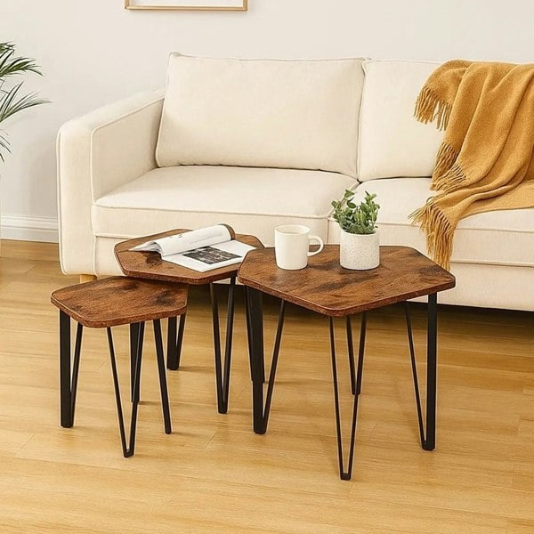 Set of 3 rustic brown nesting coffee tables with black steel frames

