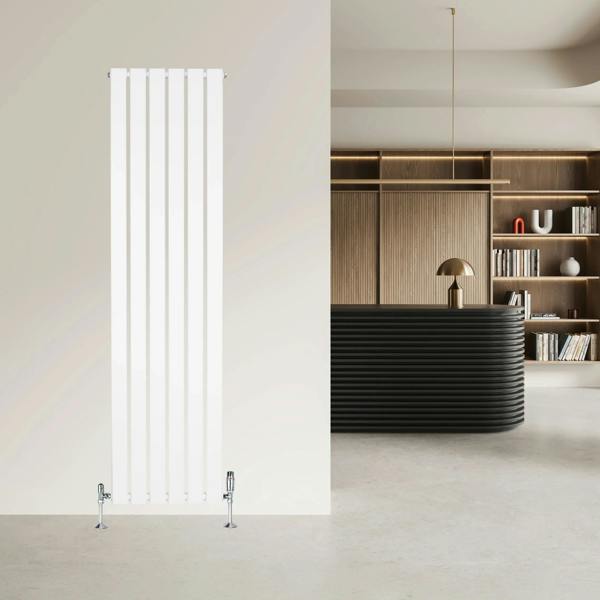 Sleek white flat single column radiator with valves, measuring 1600mm x 420mm, set against a modern interior backdrop