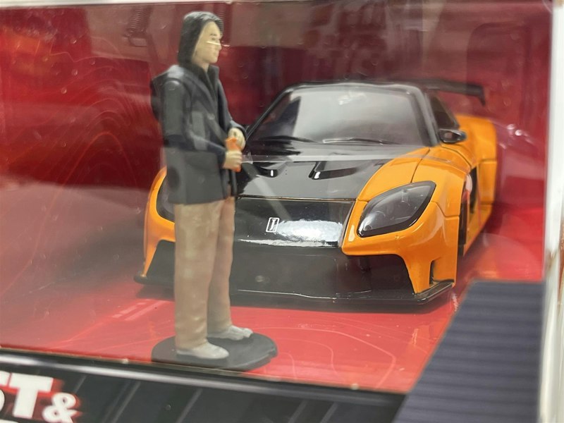 a toy car in a case