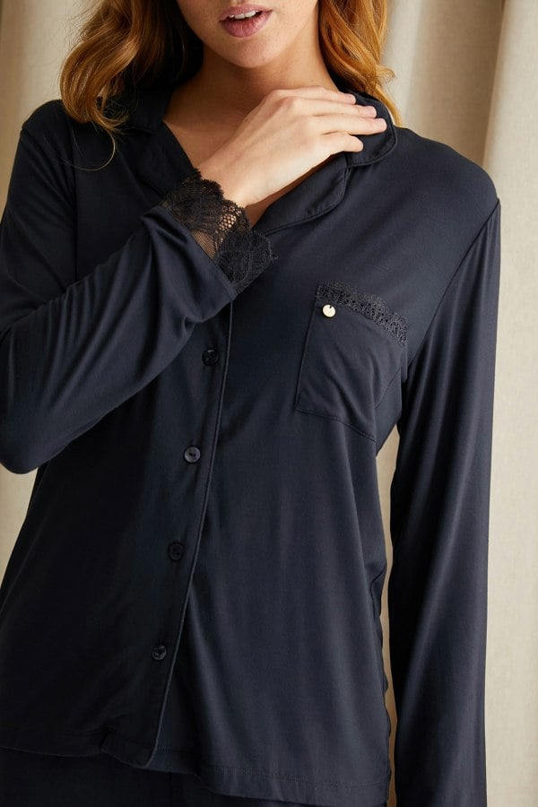 Women's Bamboo Lace Long Pyjama Set in Raven with delicate lace trims, iridescent tonal buttons and revere collar finished with tonal piping from Pretty You London