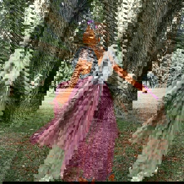 Flower girl wearing the Serendipity Dress by UK Flower Girl Boutique