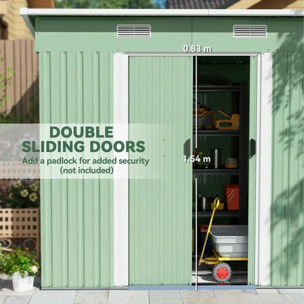 Light green metal storage shed with double sliding doors open, showing interior tools