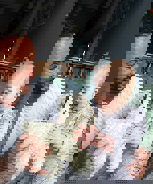 Dad and child with lambert pull along toy 