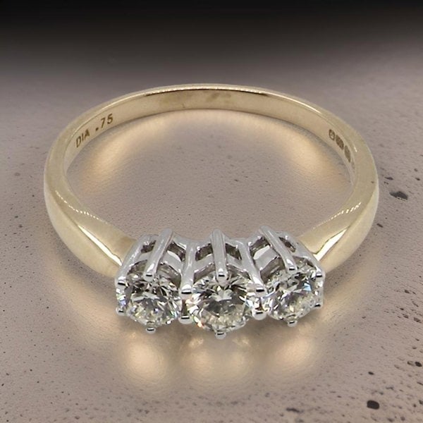 Vintage Tom A modern three stone Diamond Ring