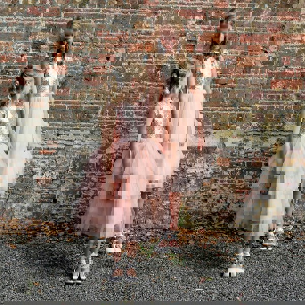 flower girls wearing dresses from uk flower girl boutique