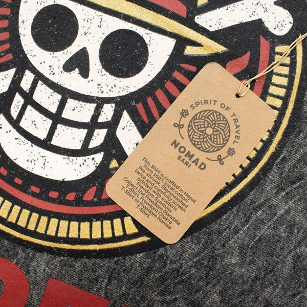 Charcoal T-shirt with Rebel skull artwork and hanging NOMAD SARI tag