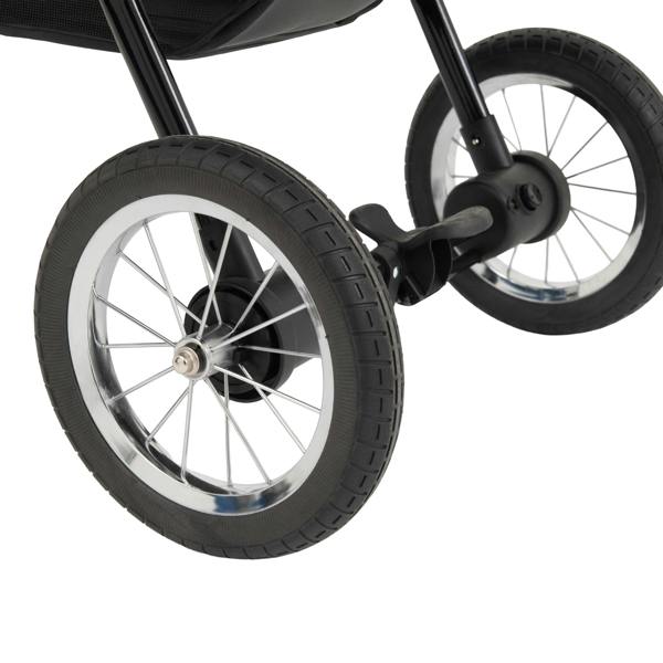 Black pet jogger featuring durable rubber wheels with silver rims, designed for smooth rides and easy maneuverability on various terrains