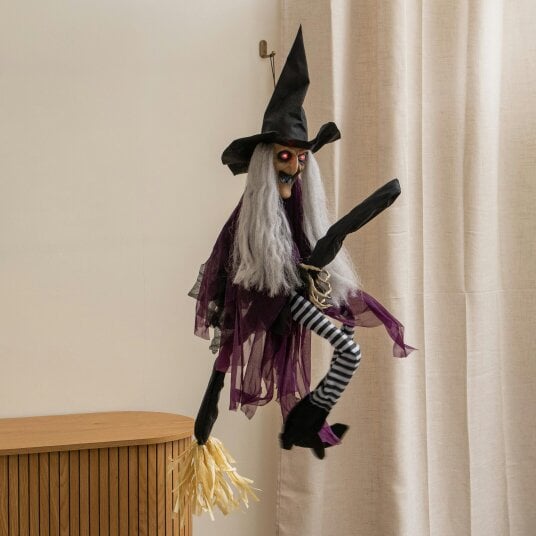 Samuel Alexander 90cm Animated Hanging Halloween Witch with Red Light Up Eyes & Sound
