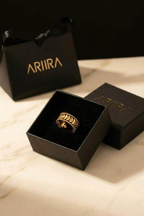 ARIIRA Meadow Gold Tone Open Leaf Band