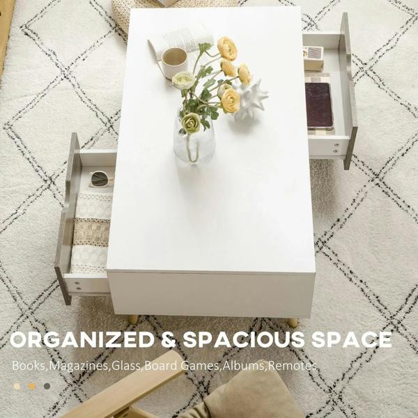 White coffee table with open storage compartment and two drawers, set up in living room