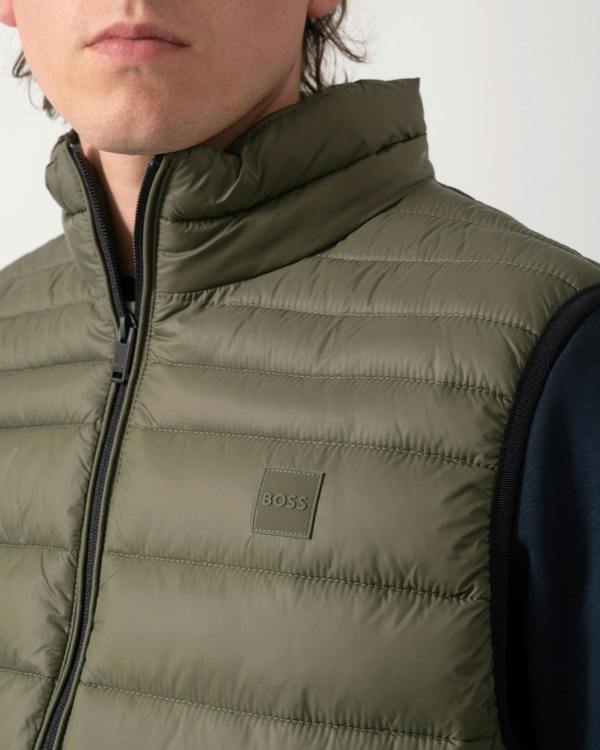 detail shot of a model wearing a BOSS Orange Odeno 2 Mens Gilet in Bright Green 325