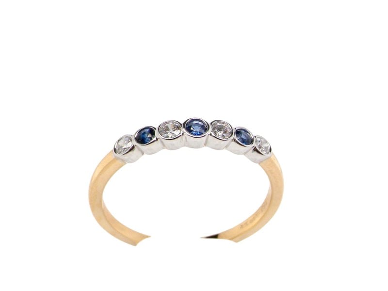 A half hoop Sapphire and Diamond  Ring