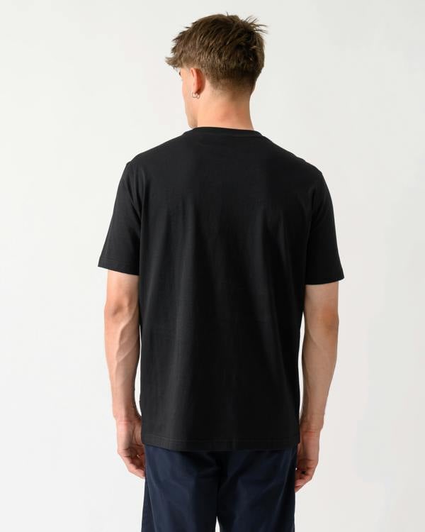 back shot of a model wearing a BOSS Orange Te Blueprint Mens T-Shirt in Black 001