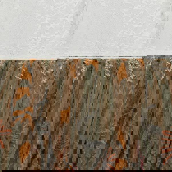 Textured fabric with floral patterns on a white background