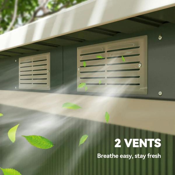 Light green metal shed roof vents with airflow grilles under overhang