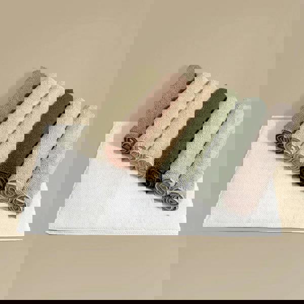 Organic cotton bath mats in various trendy colours for a modern and contemporary bathroom.