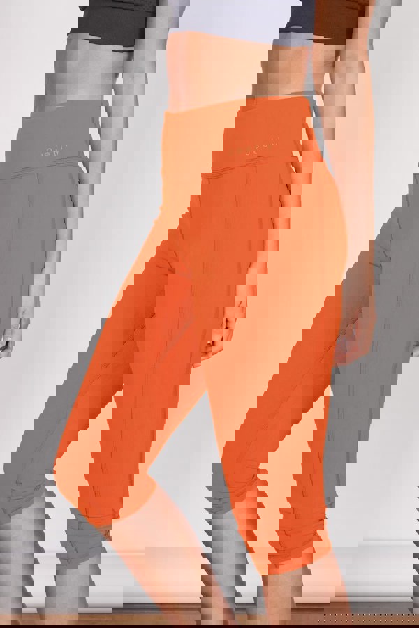 Jeetly.comTaylor Orange 3/4 Sports LeggingsActivewear