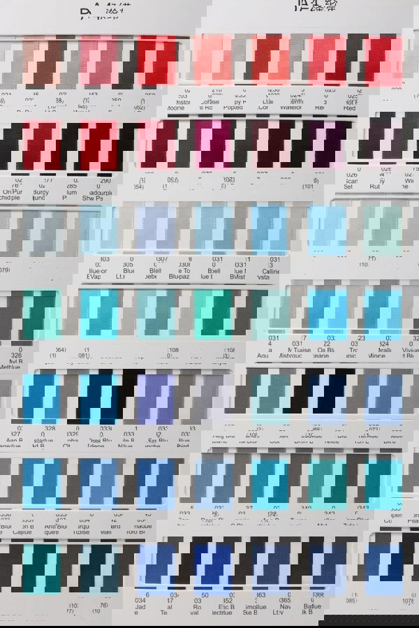 Color swatch chart with various shades of red, blue, and other colors.