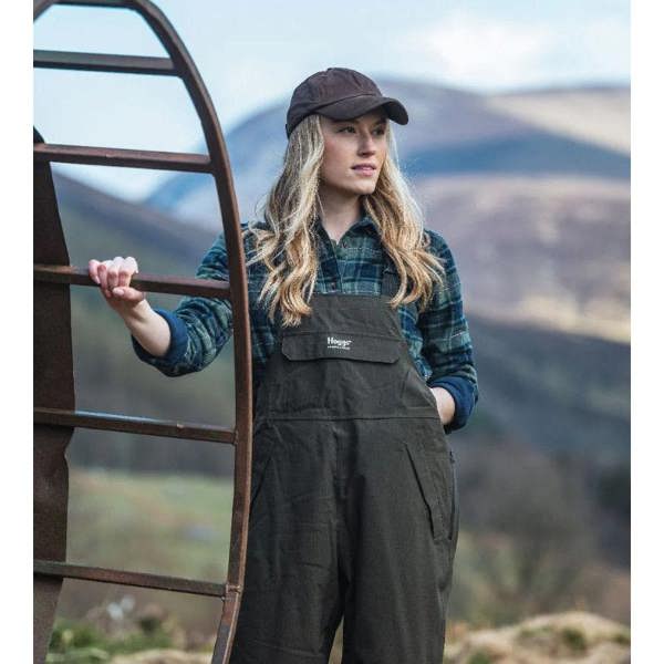 Women farmer wearing the Hoggs of Fife bib and brace out on the field