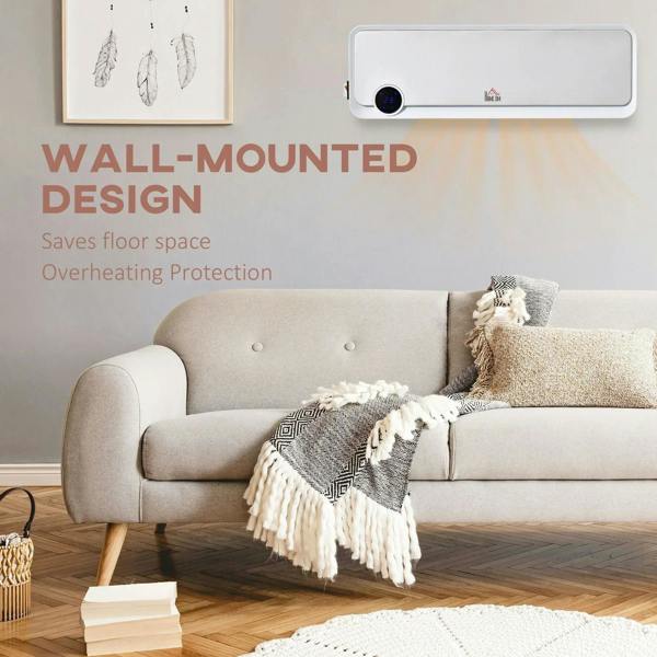 White wall-mounted electric heater installed above a sofa for space-saving heat