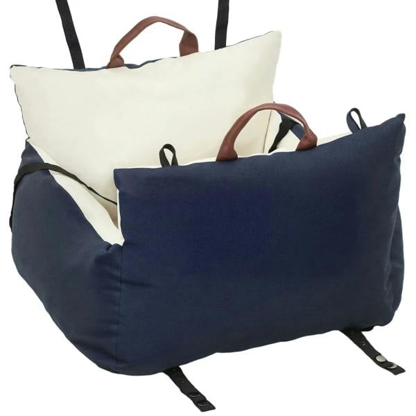 Navy dog car booster seat with cream lining, carry handle, and adjustable safety straps