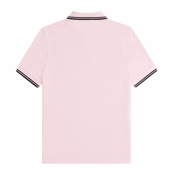 Back view of an iced pink Fred Perry cotton polo shirt with navy twin-tipped collar and sleeve cuffs.